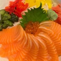 Sake Don · Freshly sliced Salmon served over a bed of sushi rice, with a side of Japanese pickled veget...