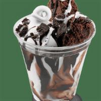 Brownie Oreo Cupfection · DQ Vanilla Soft Serve With Brownies Oreo, Chocolate Syrup And Marshmallow Topping.