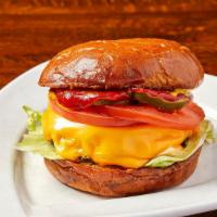 Cheeseburger · Our custom blend of short rib, brisket and sirloin served on a brioche bun.