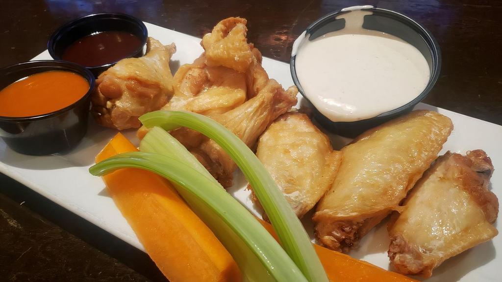 1Lb Chicken Wings Platter · Fresh, never frozen jumbo wings tossed in your choice of sauces and served with celery, carrots, Finn's Fries, Kickin' colelsaw and a side of ranch or bleu cheese dressing.