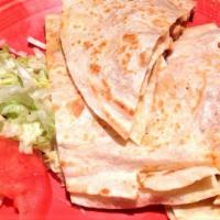 Chicken & Cheese Quesadilla · Quesadilla filled with cheese and grilled chicken in salsa ranchera.  Lettuce and tomato on ...