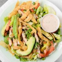 Fiesta Chicken Salad · Crisp romaine lettuce, sliced avocado, tomatoes, green onions, and corn tortilla strips.  To...