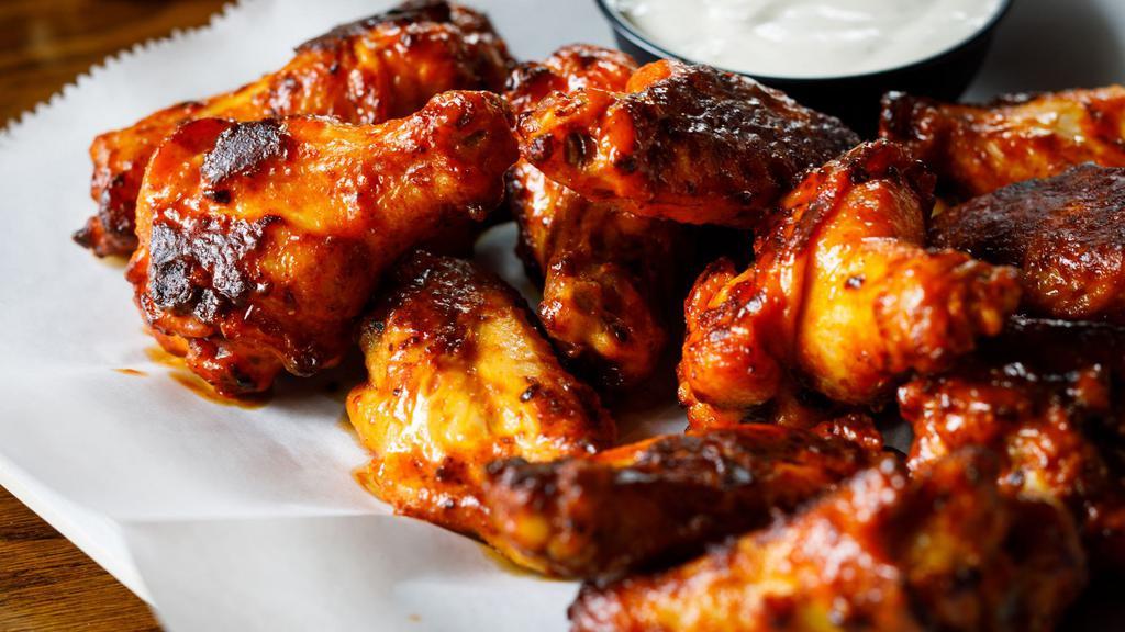 Wichita Wings (12) · Twice baked wings tossed in your choice of Buffalo, BBQ or Ziggy's Blend, Sweet Thai Chili, or Caribbean Jerk Dry Rub served with a side of Ranch or Bleu Cheese.