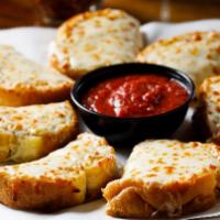 Cheesy Garlic Bread · Loaded with mozzarella, served with a side of warm marinara.