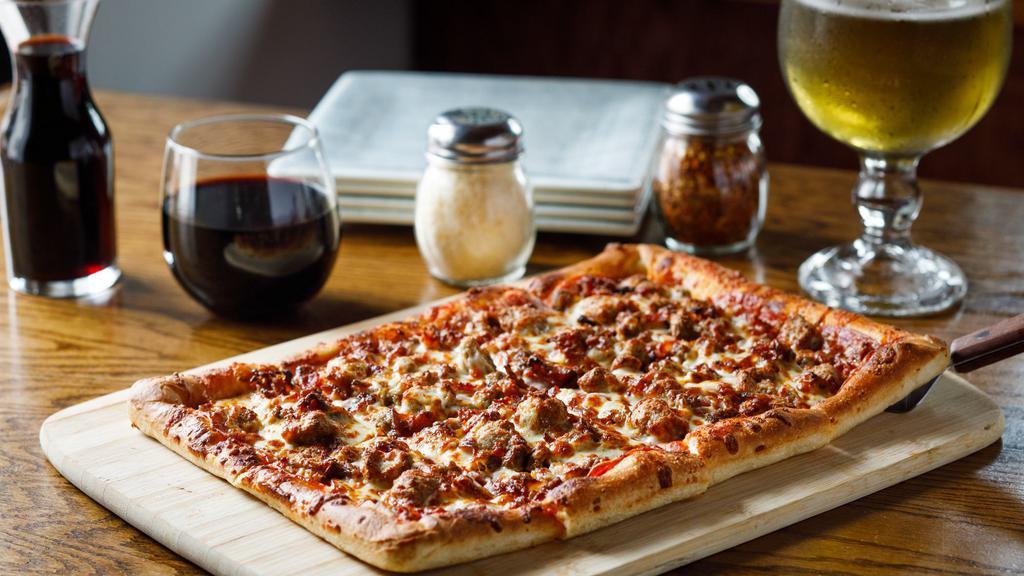 Meat Me At Ziggy'S · Pepperoni, Italian sausage, smoked bacon, beef and Canadian bacon on marinara.