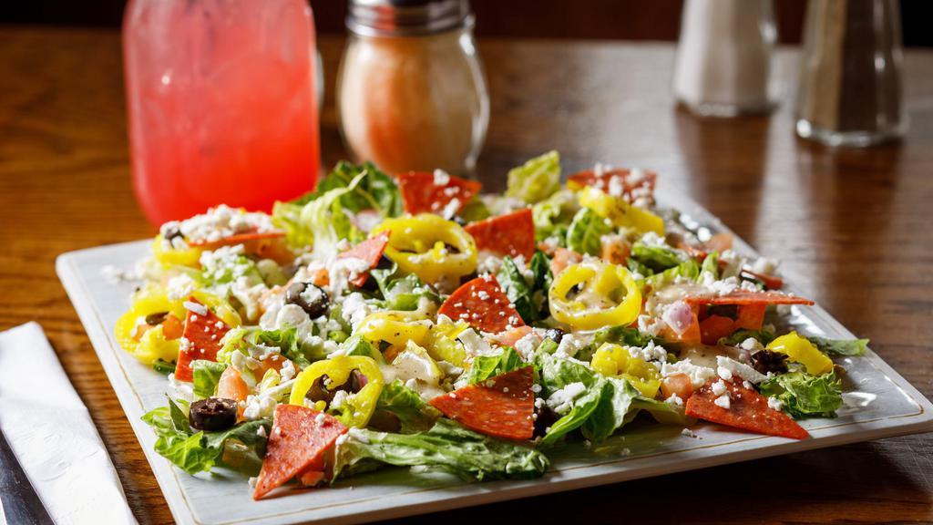 Full Italian Salad · Mama's famous blend of fresh romaine lettuce, banana peppers, black olives, pepperoni, diced tomato, onion and feta served with our house Italian dressing.