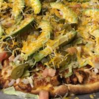 Taco Pizza · Pizza Sauce, Ground Beef and Jalapeños Topped with Lettuce, Tomato, Onion, Avocado, and Ched...
