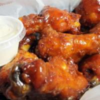 Wings - Two Kinds (7) · Breaded or grilled naked. Hot, teriyaki, sweet chili pepper, garlic parmesan, sweet Asian se...