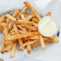 Truffle Parm Fries · Cut fresh then sprinkled with Parmesan and truffle salt served with garlic mayo.