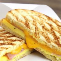 Breakfast Sandwich  · Egg, Swiss, Cheddar, or Provolone, With Veggies, Ham, or Bacon, Grilled to Perfection.