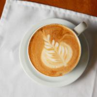 Caffe’ Latte · Double shot of espresso, steamed milk, and your choice of flavor.