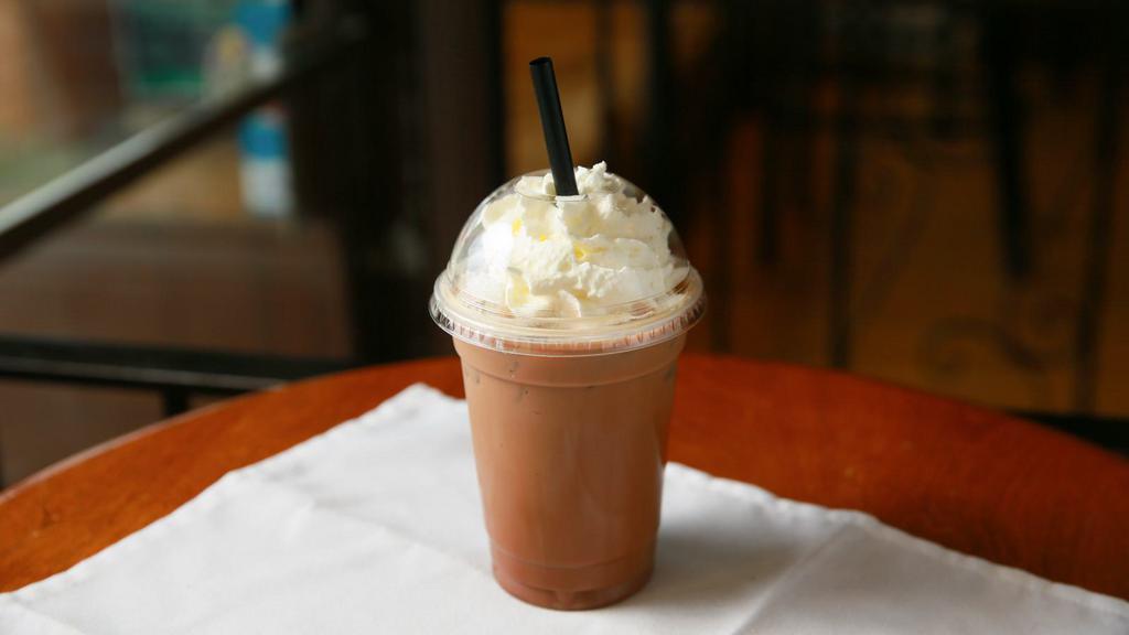 Iced Mocha · Two shots of espresso, rich chocolate, and milk over ice.