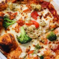 Vegetariana · Tomato sauce, mozzarella, brick oven roasted seasonal vegetables