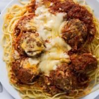 Jasko'S Balls · Jasko's house-made, ground beef and herb meat balls served in our pomodoro gravy over your c...