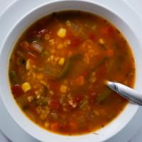 Minestrone · Spicy tomato and vegetable soup combined with pasta, basil and parmigiano