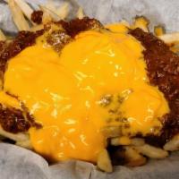 Chili Cheese Fries · Seasoned fries smothered in our Chili with your choice of cheese melted on top. Make it a De...