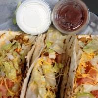 Tacos · Your Choice of Beef or Chicken (3). Lettuce, Tomato, Onions, and Cheese in a hard shell or s...