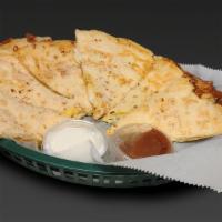 Chicken Quesadilla · A blend of three cheeses on two 12