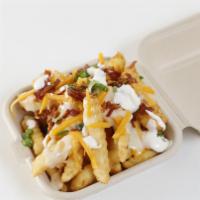 Loaded Fries · Get your salty fix with French fries loaded with gooey queso, cheddar, sour cream, green oni...