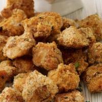 Grandma'S Fried Chicken Poppers · Tender chicken thighs marinated in buttermilk & honey, dusted with our secret seasoning. Ser...