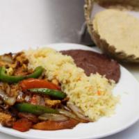 Chicken Or Steak Fajitas · Served with rice, beans and tortillas.