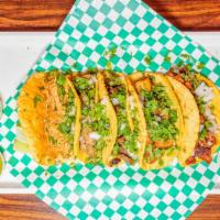 Street Tacos · Handmade tortillas. Served with cilantro, onions, hot or mild salsa, and your choice of prot...