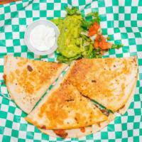 Quesadillas · Served with guacamole, sour cream, lettuce, pico de gallo, and your choice or protein.