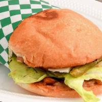 Tortas · Served with beans, queso fresco, avocado, lettuce, tomato, jalapeños, mayonnaise, and your c...