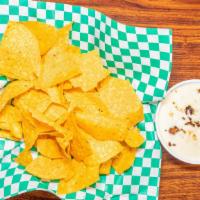 Chips & Queso Chorizo · Chips with delicious queso dip and chorizo meat.