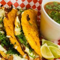 Tacos De Birria Combo · 3 hand made tortillas with cheese cilantro onions side consome soup