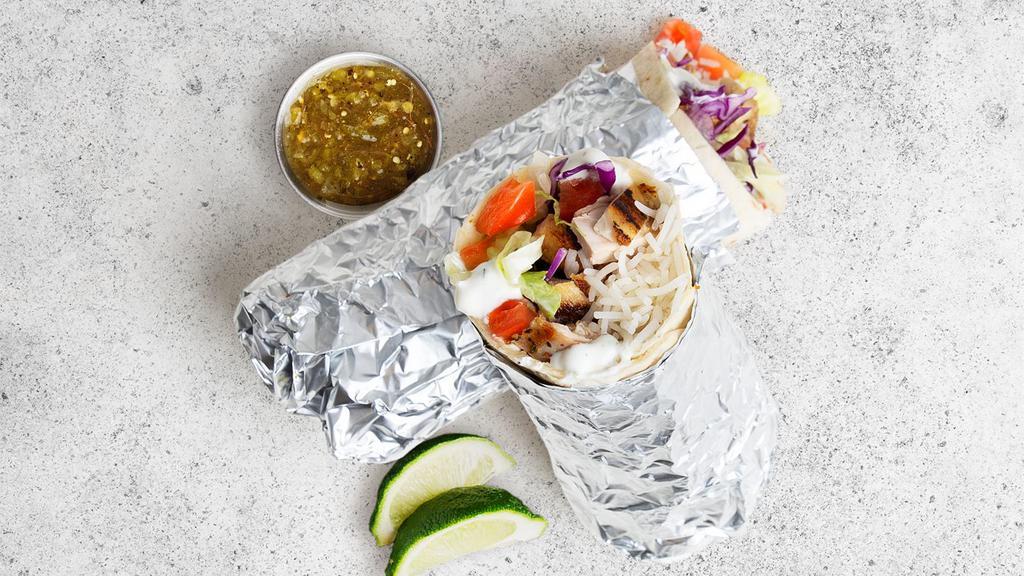 Grilled Chicken Burrito · Seasoned grilled chicken with shredded cabbage, diced tomatoes, cilantro, and tzatziki or tahini wrapped in a flour tortilla.