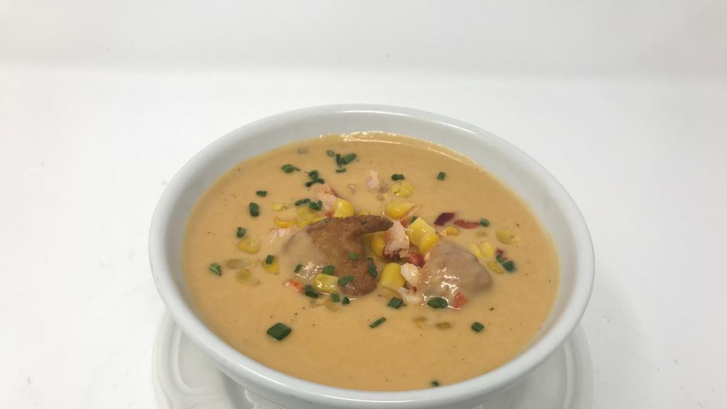 Lobster Bisque · Sweet corn fritter and maine lobster.
