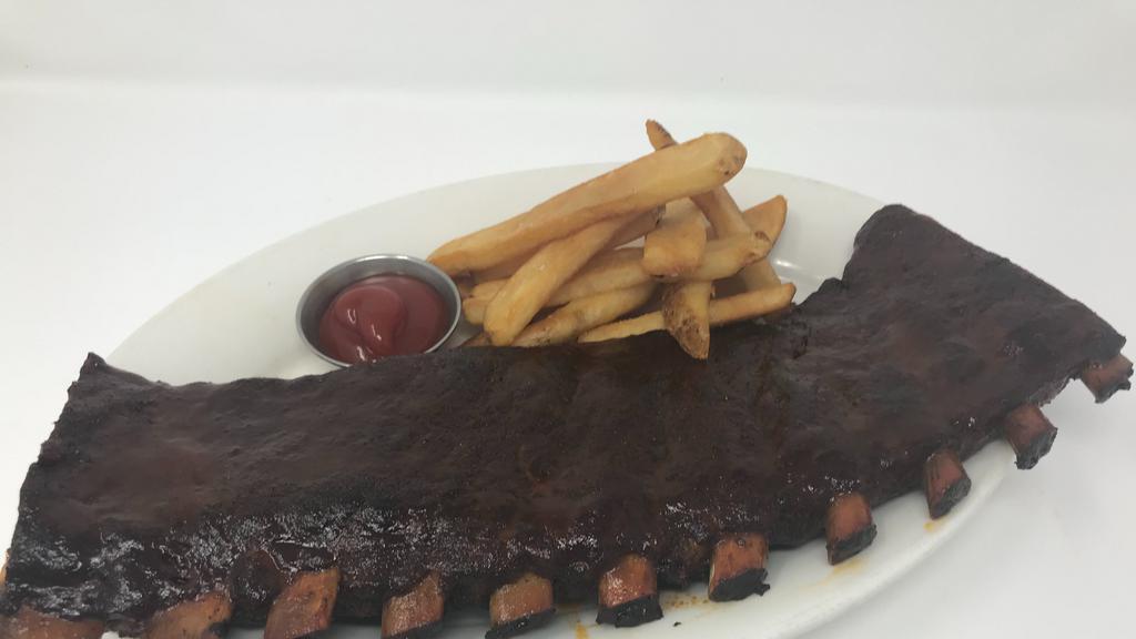 The Barn’S Bbq St. Louis Style Pork Ribs
 · Slow cooked in our smokehouse with house rub, bourbon BBQ sauce, and steak fries.