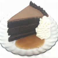 Chocolate Cake · Caramel chocolate cake and whipped chocolate frosting.