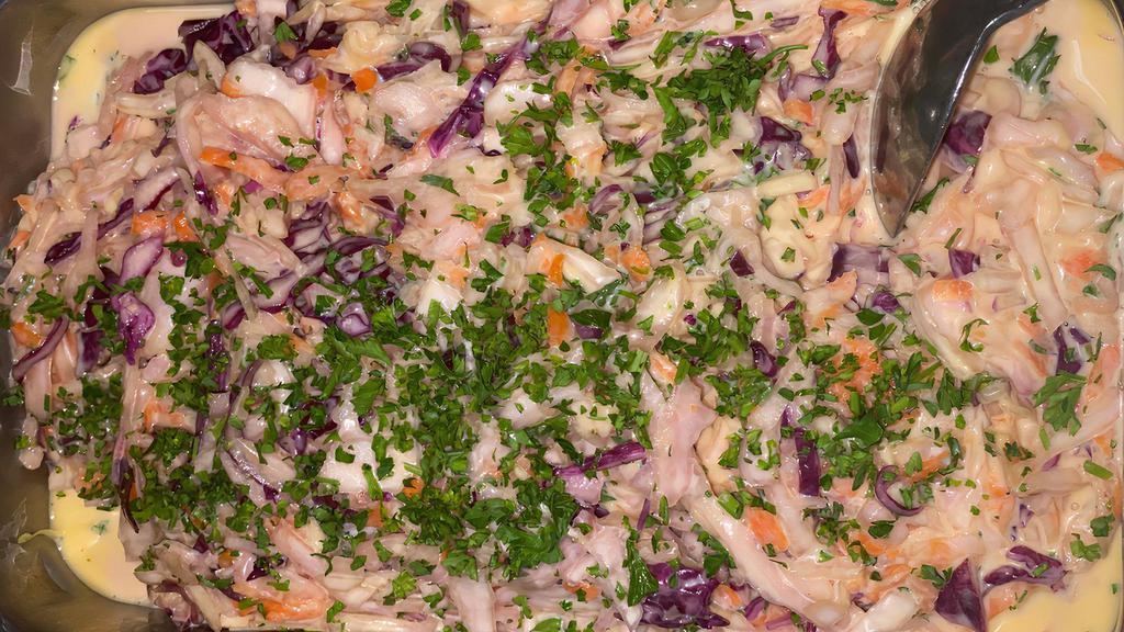 Coleslaw · Our homemade coleslaw with authentically sweet kick.