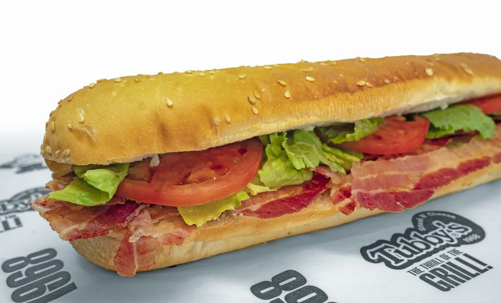 Blt Sub · Made with bacon, lettuce, tomatoes, mayonnaise, lettuce, tomato, and famous dressing.
