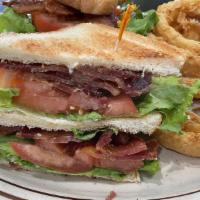Double Decker Blt · Served on toasted sliced white or wheat bread, served with mayo, lettuce and tomatoes.