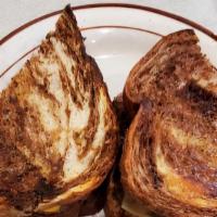 Patty Melt · Served on rye bread, topped with grilled onions and Swiss cheese, served with mustard or tho...