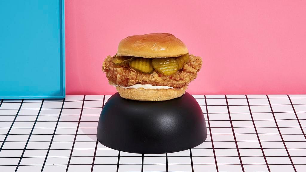 Fried Chicken Sandwich · Crispy fried chicken sandwich with mayo and pickles on a toasted bun. Served with french fries.