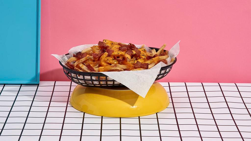 Bacon Cheese French Fries · French fries topped with bacon bits and melted cheese