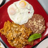Chilaquiles · Fried corn tortilla simmered in green or red sauce mixed up with
Chorizo topped with two egg...