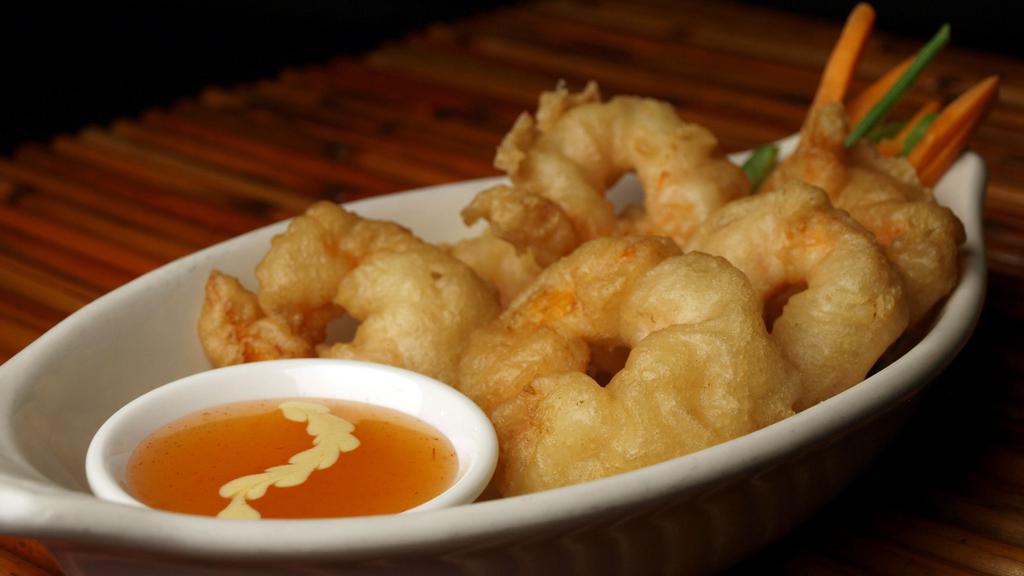 Butterfly Shrimp (6) · Large shrimp butterflied and dipped in a tempura batter.
