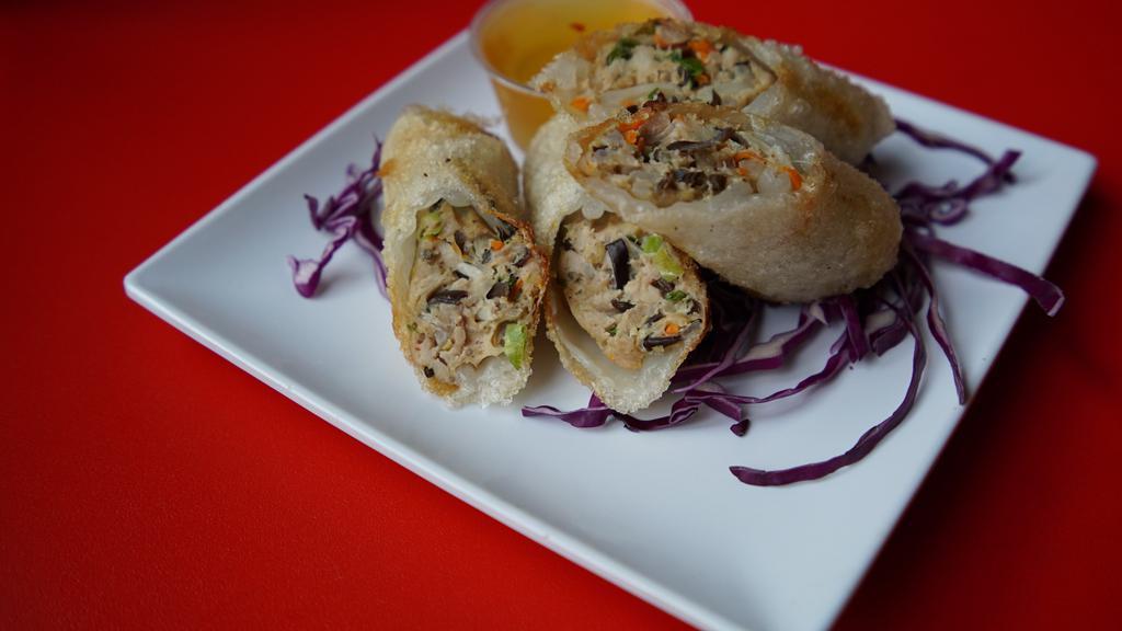Crispy Roll Plate · Gluten-free. Two pieces. Ground chicken, black mushroom, bean thread noodle, carrot, bean sprout, green onion and crispy rice paper with sweet chili sauce.
