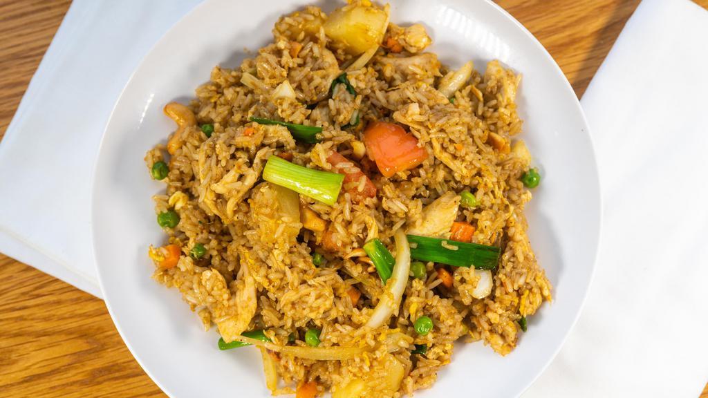 Sy'S Fried Rice · Top item. Rice, yellow curry powder, pineapple, cashew nut, tomato, pea, carrot, onion, green onion, and egg.
