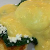 Eggs Benny · English muffin, ham, poached eggs, and Hollandaise sauce.