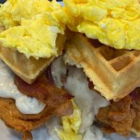 Southern Chicken & Waffles · Crispy chicken breast strips, waffle, sausage gravy, bacon & 2 eggs.
