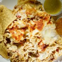 Nachos Locos · Served with beans, sour cream, guacamole, and beef or chicken. Add steak for $1.50 extra