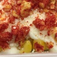 Elote With Hot Cheetos (Large) · Corn in a cup topped with mayonnaise, cheese, butter and crushed cheetos. Chile powder optio...
