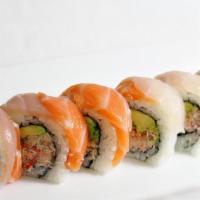 Rainbow Roll · Inside: Snow crab, avocado, cucumber. 
	Outside: a colorful “rainbow” of  5 kinds of fish