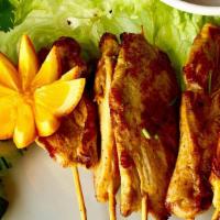 Chicken Satay · Six Pieces. Marinated and grilled. Served with peanut sauce.